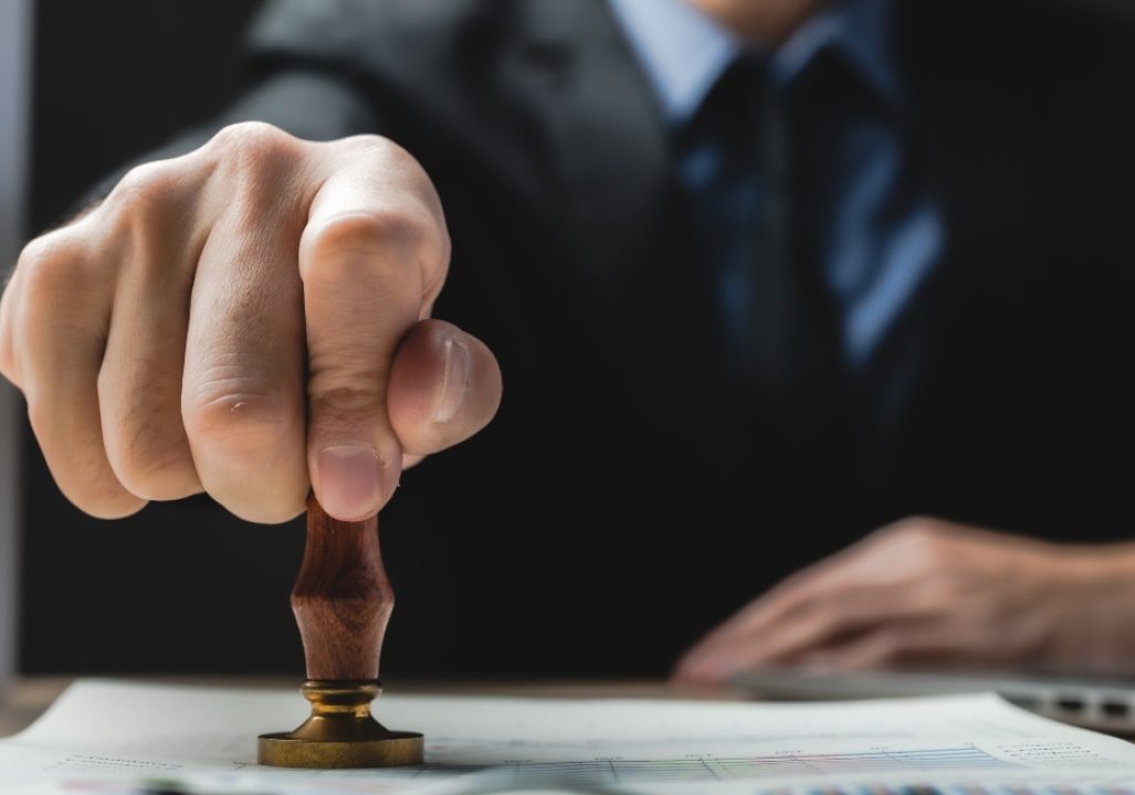 Visa stamp hand 1100x650 1