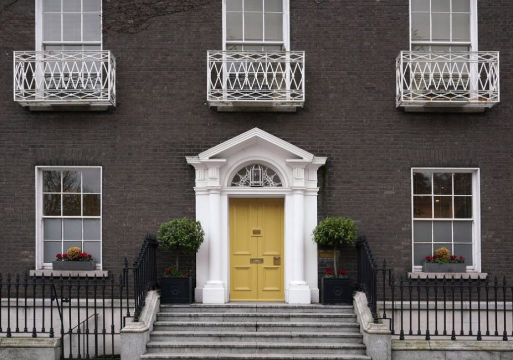 Dublin, Ireland. Old Fashioned Georgian Style Townhouse with Bright Yellow Front Door