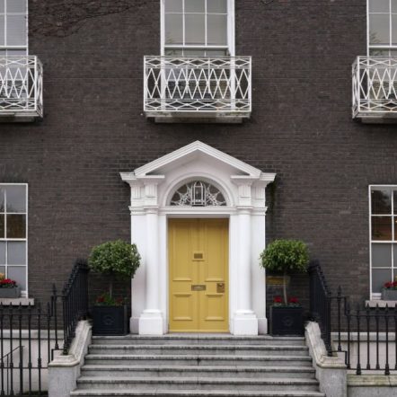 Dublin, Ireland. Old Fashioned Georgian Style Townhouse with Bright Yellow Front Door