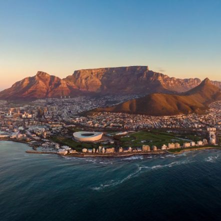 Aerial panoramic view of Cape Town cityscape at sunset, Western Cape Province, South Africa.