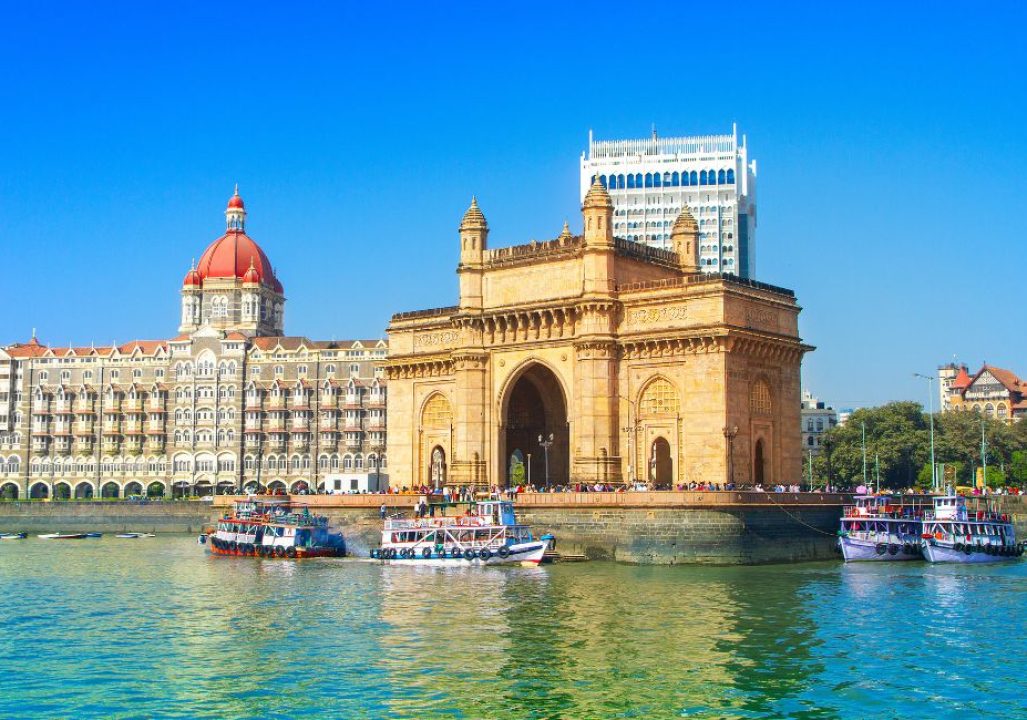 The Gateway of India and boats as seen from the Mumbai Harbour in Mumbai, India
