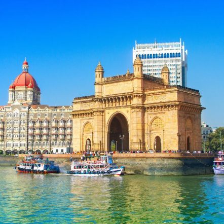 The Gateway of India and boats as seen from the Mumbai Harbour in Mumbai, India