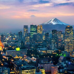 Tokyo city skyline with Mount Fuji in the background.