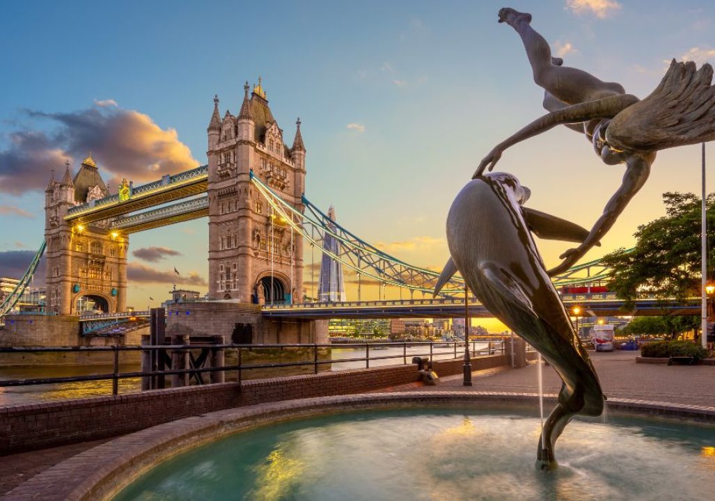 Girl With A Dolphin fountain with the Tower Bridge in the background.