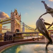 Girl With A Dolphin fountain with the Tower Bridge in the background.