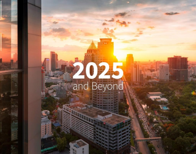 City skyline at sunset with tall buildings, lush trees, and a bustling road. Text reads 