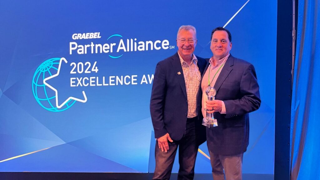 Accepting the 2024 Excellence Award at the Partner Alliance.