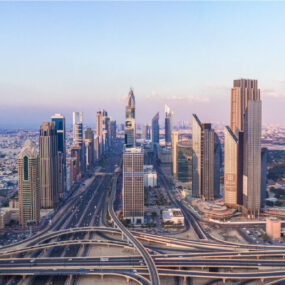 Saudi Arabia, a modern cityscape with numerous skyscrapers and a complex network of highways and interchanges.