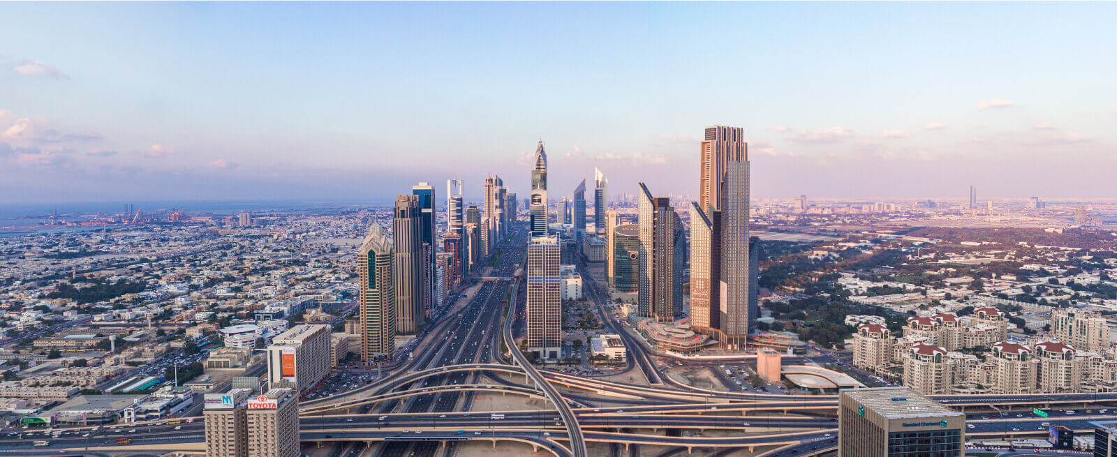 Saudi Arabia, a modern cityscape with numerous skyscrapers and a complex network of highways and interchanges.