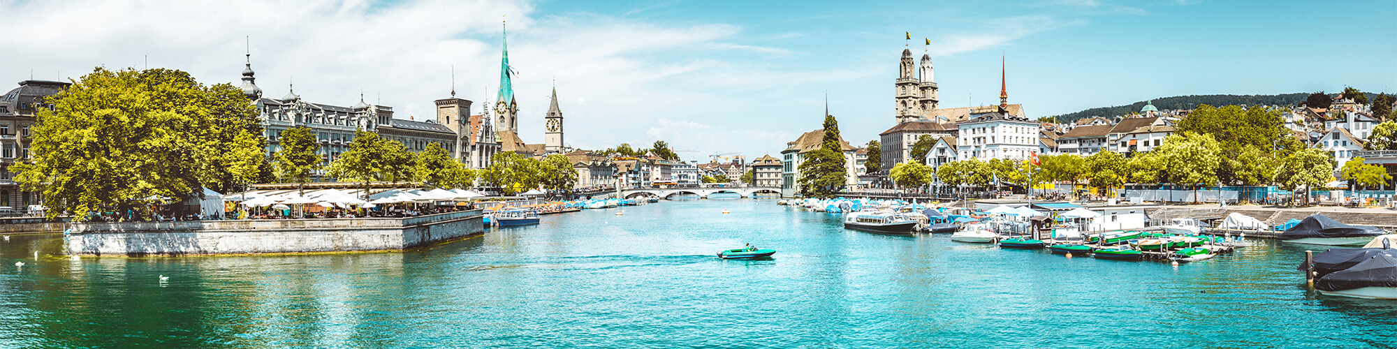 panoramic view of the historic Zurich city center with the Limmat River and Lake Zurich in the summer