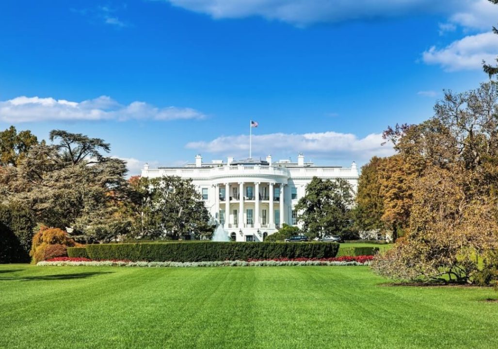 The White House lawn with the White House in the background.