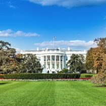 The White House lawn with the White House in the background.