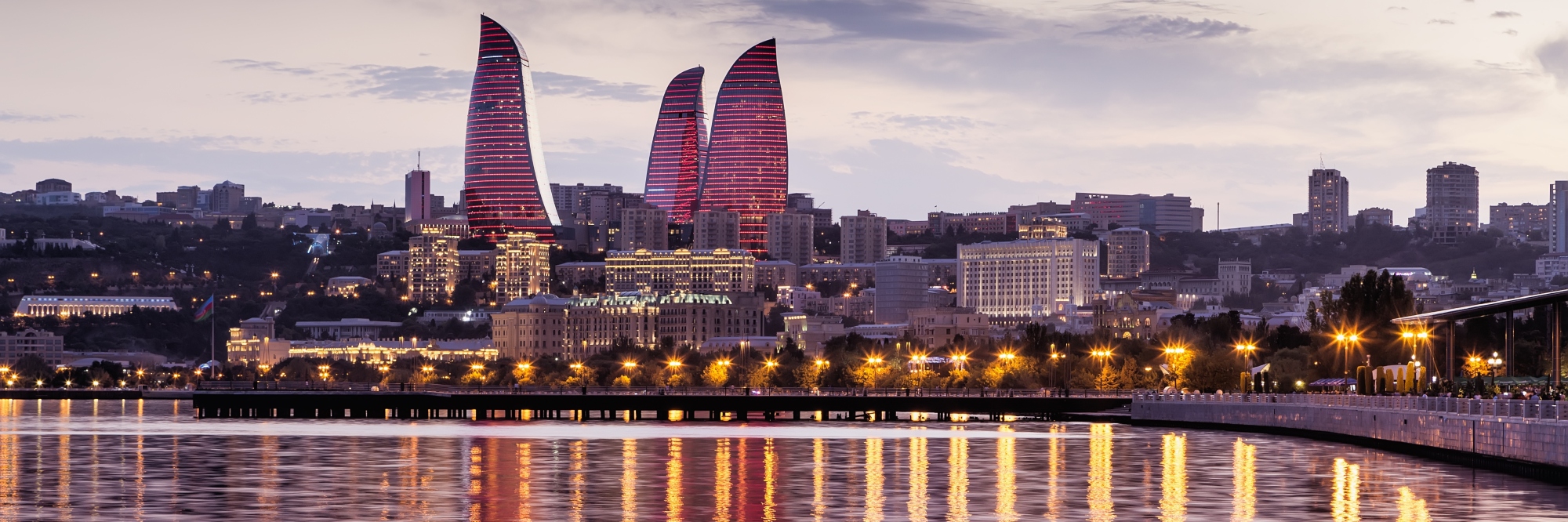 View of the waterfront and the city at night, in Baku, Azerbaijan. vintage tone filter