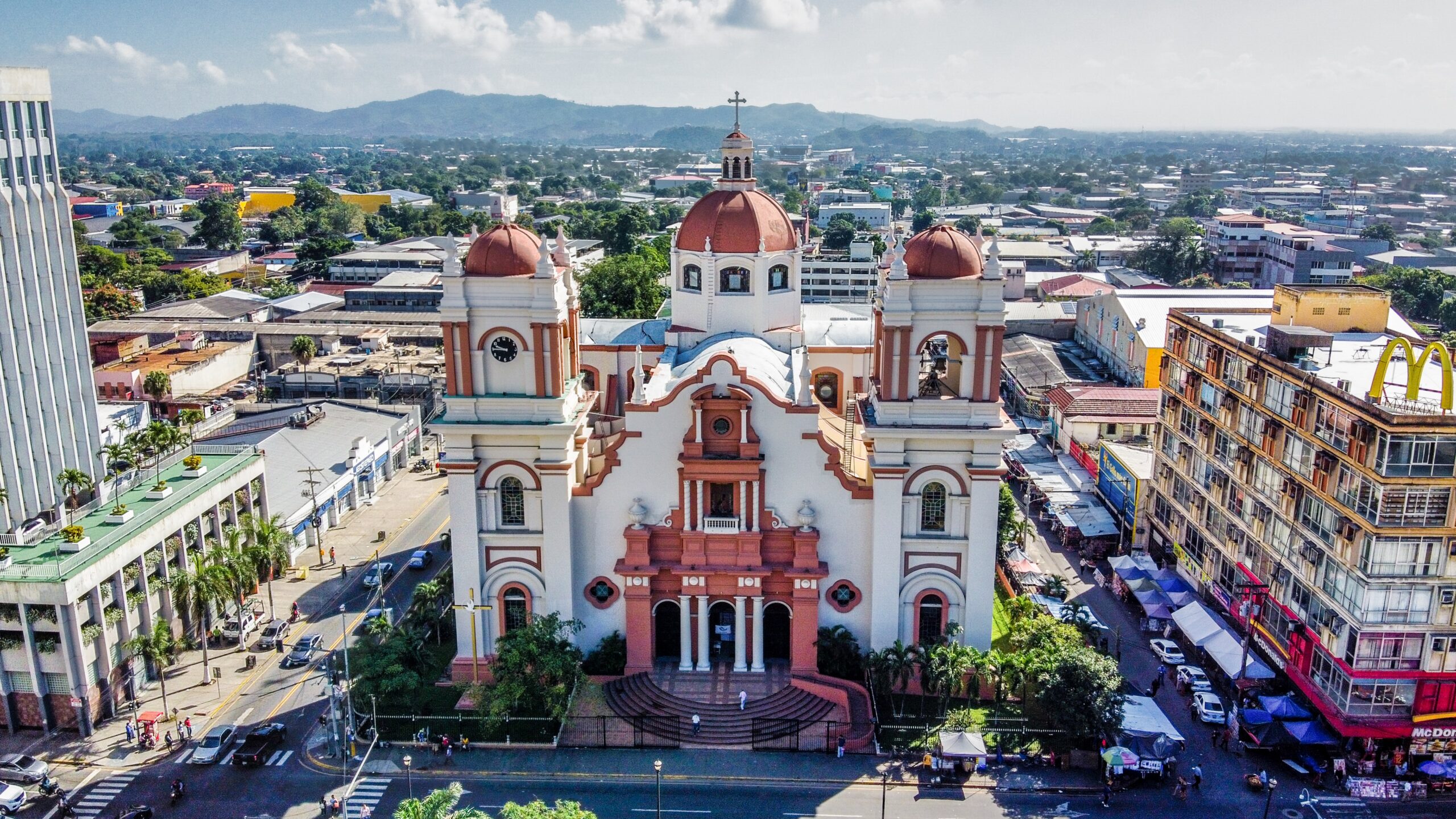 Metropolitan Cathedral of Saint Michael the Archangel in Tegucigalpa, Honduras featuring colonial architecture and twin bell towers with reddish domes.