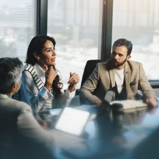 Meeting, woman in collaboration with colleagues, boardroom