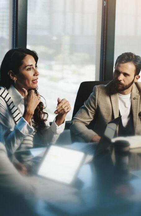 Meeting, woman in collaboration with colleagues, boardroom